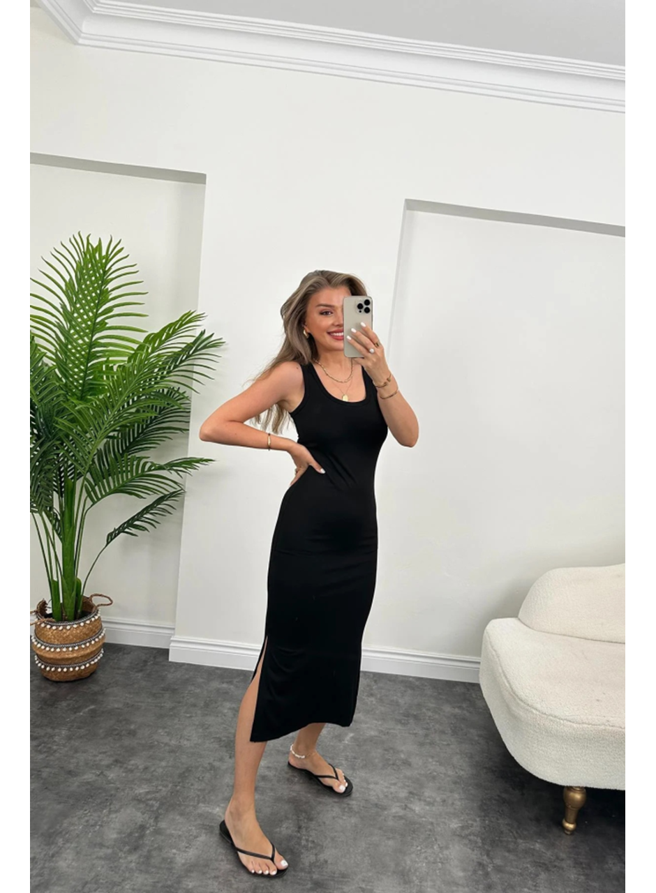 Kadın çift Yırtmaç Detaylı Sıfır Kol Midi Boy Elbise