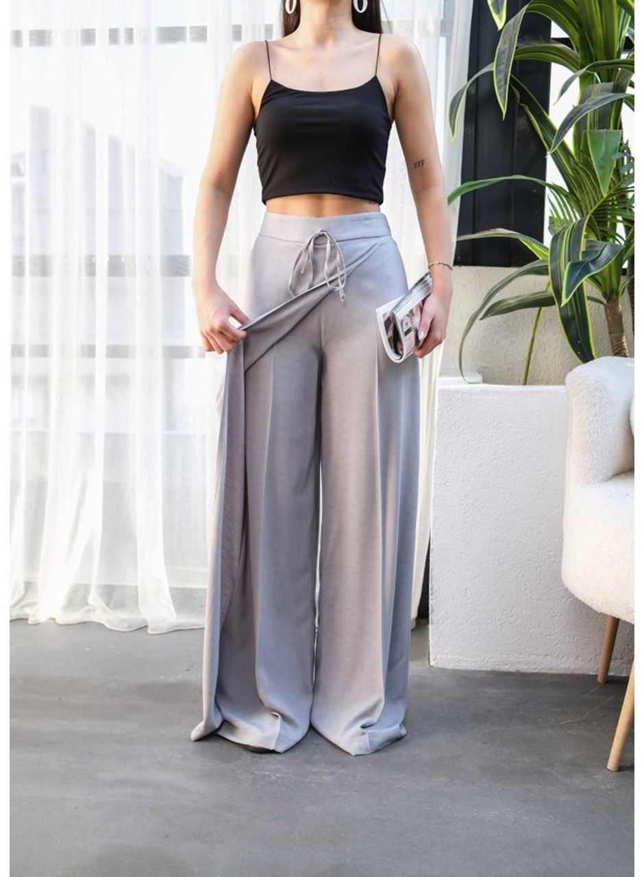 Keten Önü Çapraz Parçali Lasti̇kli̇ Ve Bağcikli Geni̇ş Paça Pantolon