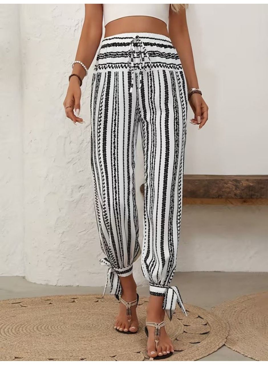 Kadın Yüksek Bel Desenli Paçadan Bağlamalı Yanları Yırtmaçlı Süprem Pantolon