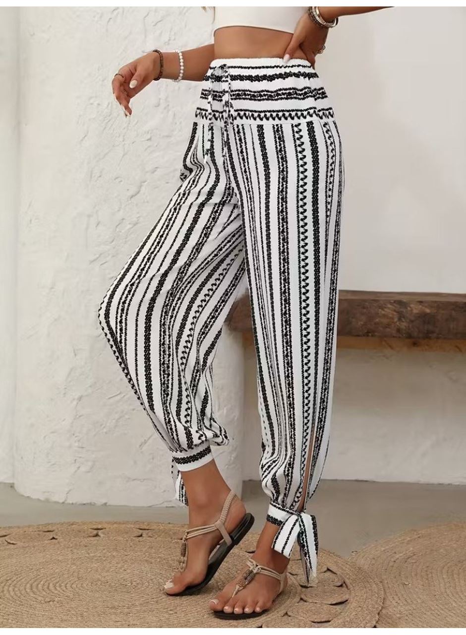 Kadın Yüksek Bel Desenli Paçadan Bağlamalı Yanları Yırtmaçlı Süprem Pantolon