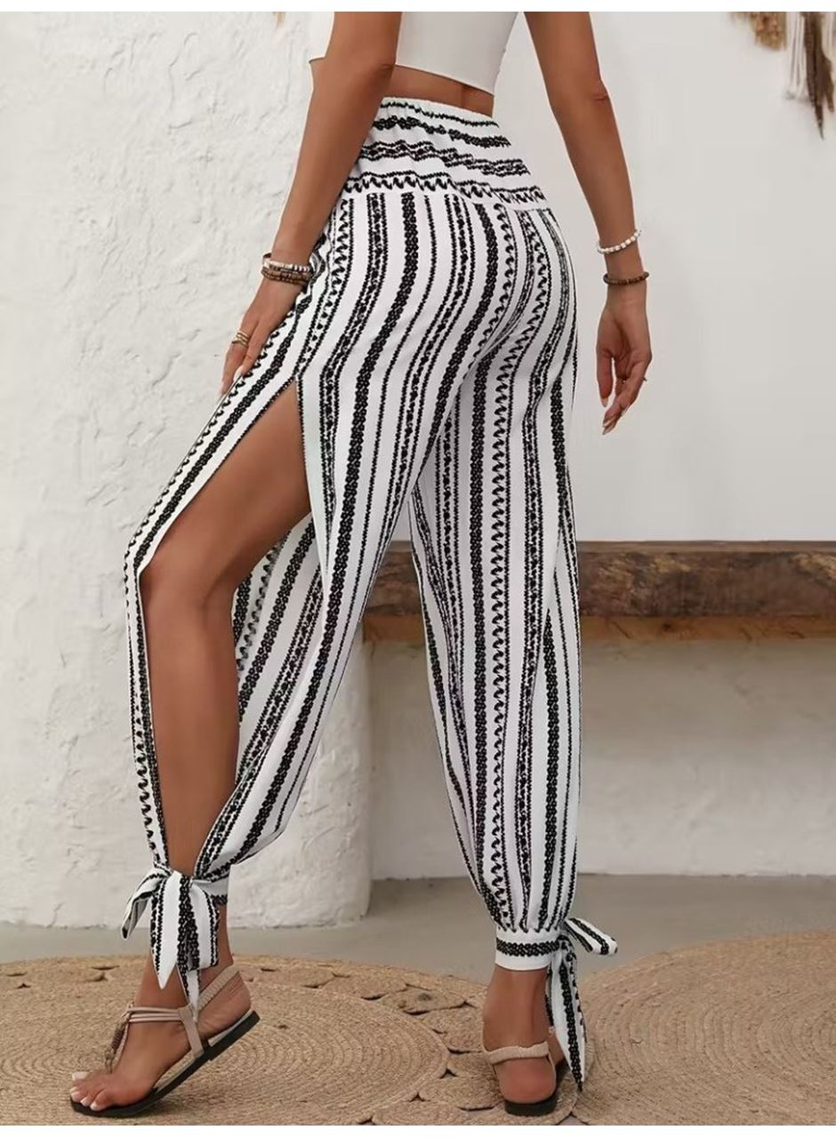 Kadın Yüksek Bel Desenli Paçadan Bağlamalı Yanları Yırtmaçlı Süprem Pantolon