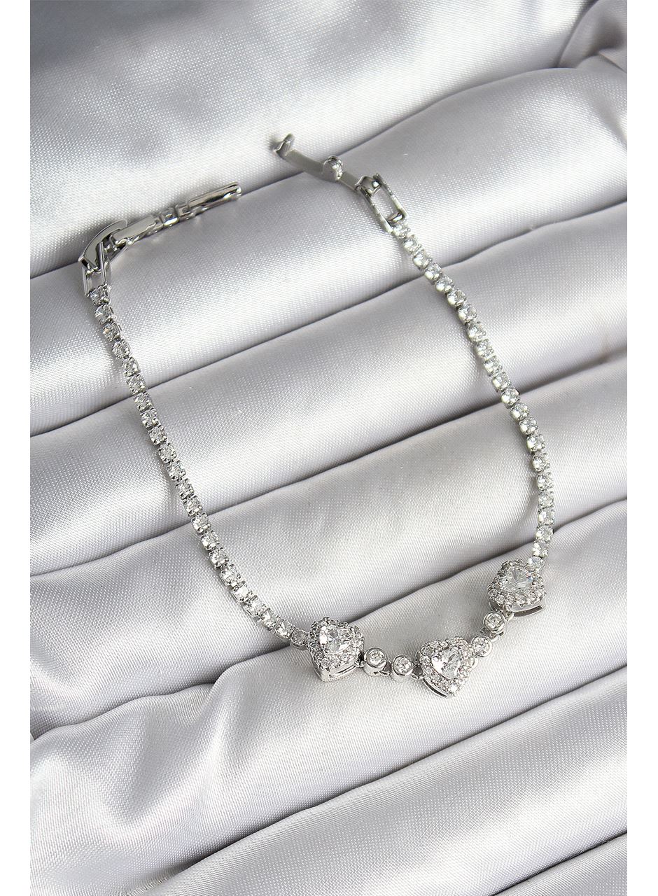 Pirinç Sıralı Kalp Figürlü Zirkon Taşlı Gümüş Renk Kadın Bileklik
