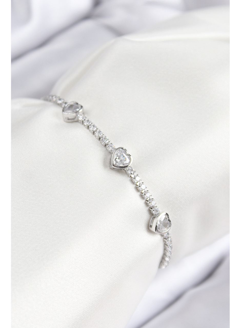 Pirinç Zirkon Taşlı Sıralı Kalp Model Gümüş Renk Asansörlü Kadın Bileklik