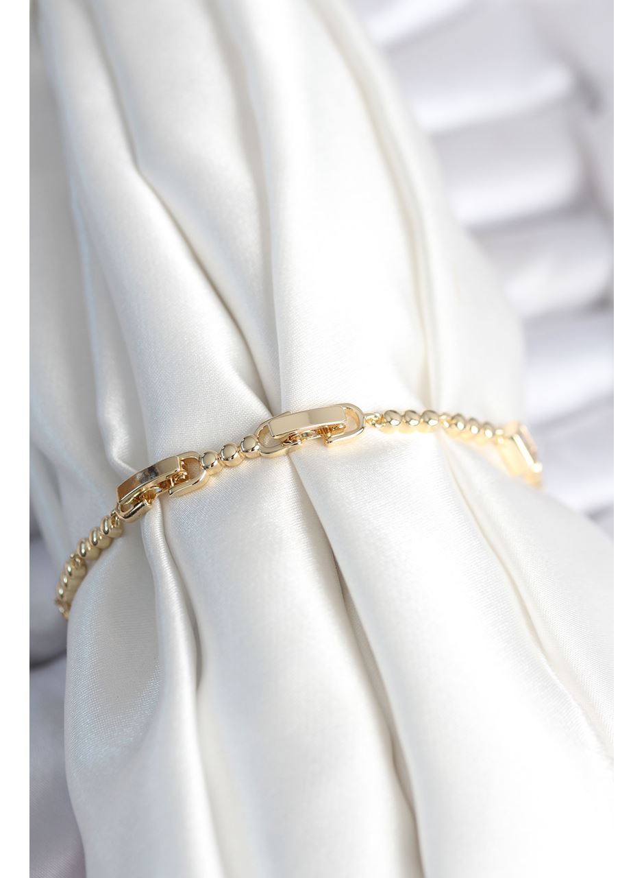 Pirinç Gold Renk Zirkon Taşlı Kalpli Model Kadın Bileklik