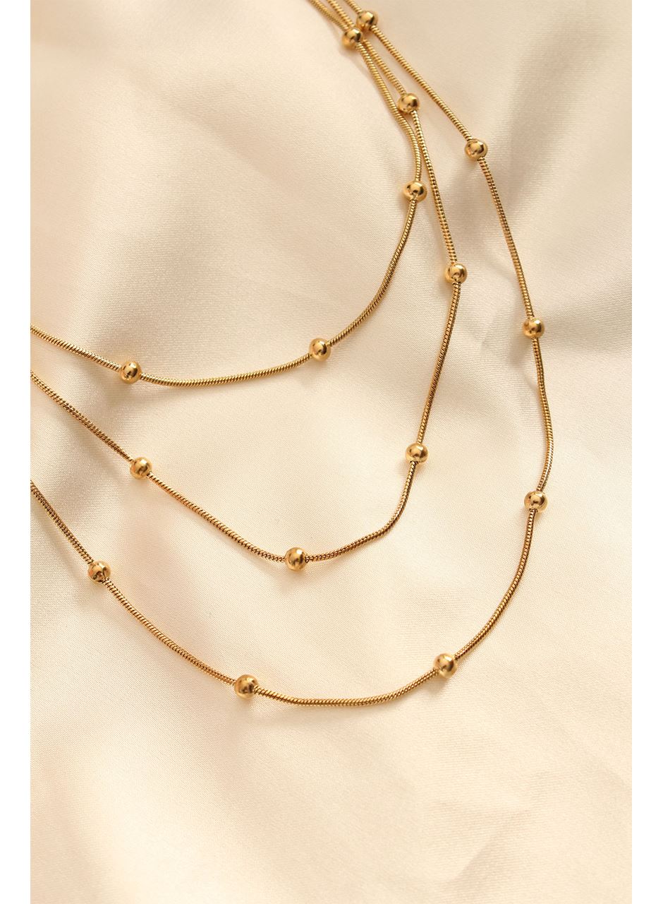 Çelik Altın Renkli Topçuk Tasarımlı Çoklu Kolye