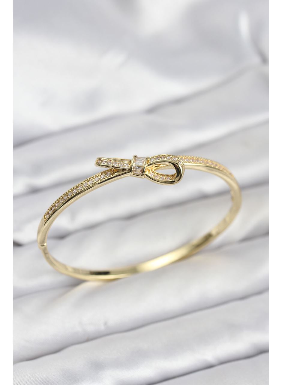 Pirinç Gold Renk Zirkon Taşlı Fiyonk Model Kadın Kelepçe Bileklik