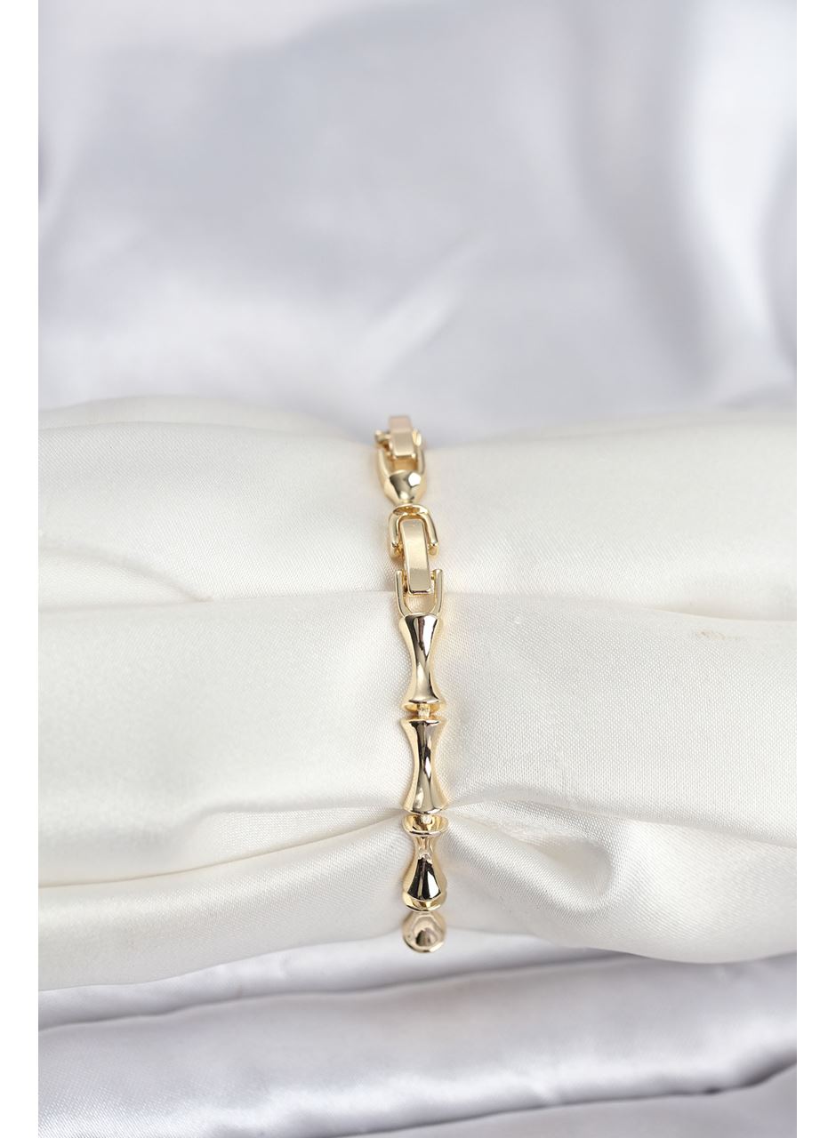 Pirinç Gold Renk VIP Seri Kemik Model Zirkon Taşlı Kadın Bileklik